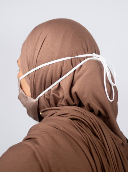 Face Mask Light Beige (behind head)